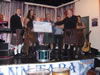 Ted & Albannach handing over the cheque of �1230 for charity, this was for the Schiehallion Ward at Yorkhill Hospital during the gig in Maryhill, This was Crann Tara organised.
